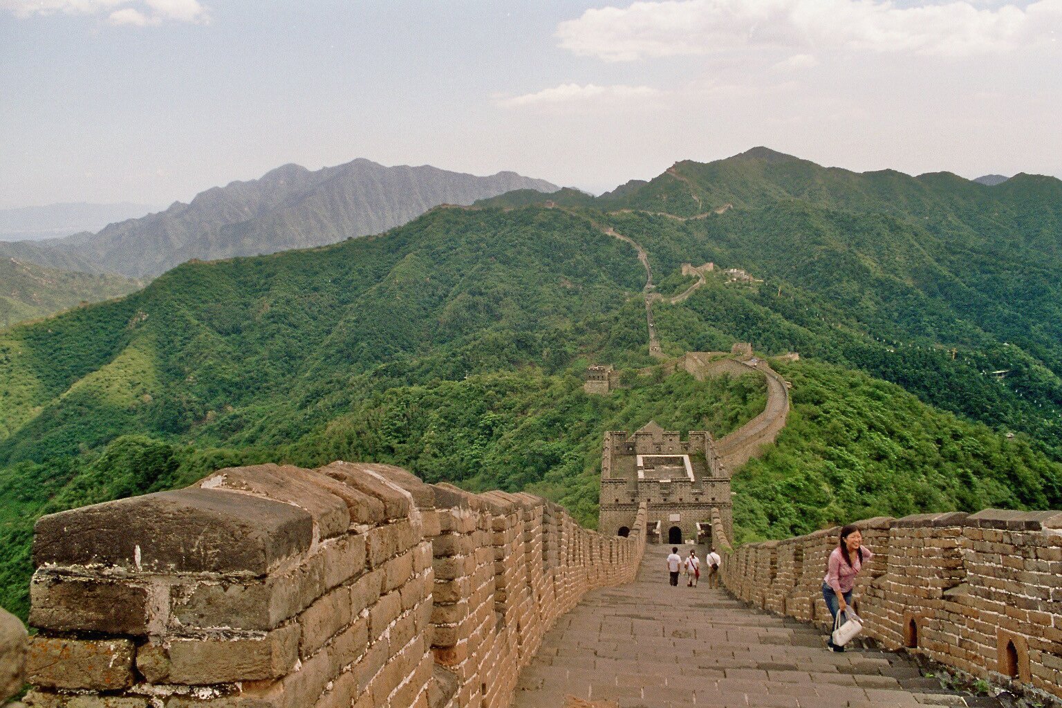 Great Wall masonry above forested ridges near Beijing